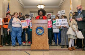 Gianna Baker, Housing Action Illinois' Outreach Manager, at the Just Housing press conference on April 24, 2019